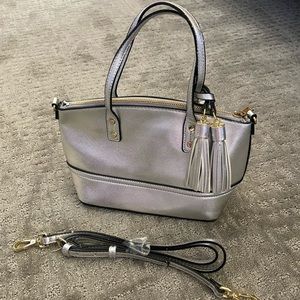 Silver Merona purse. Handles and strap.